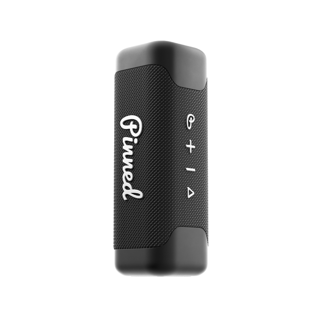 Black portable speaker with 'Pinned' branding in white on a white background