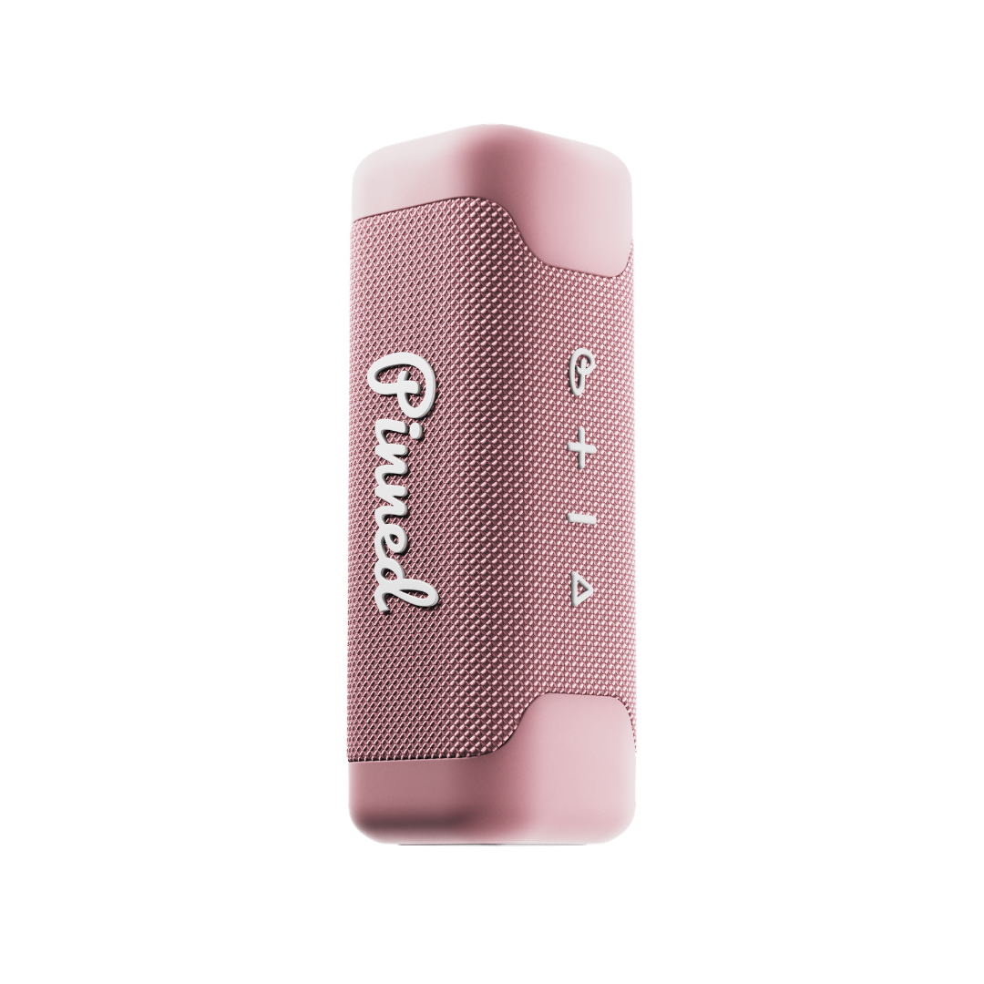 Pink portable speaker with 'Pinned' branding in white on a white background